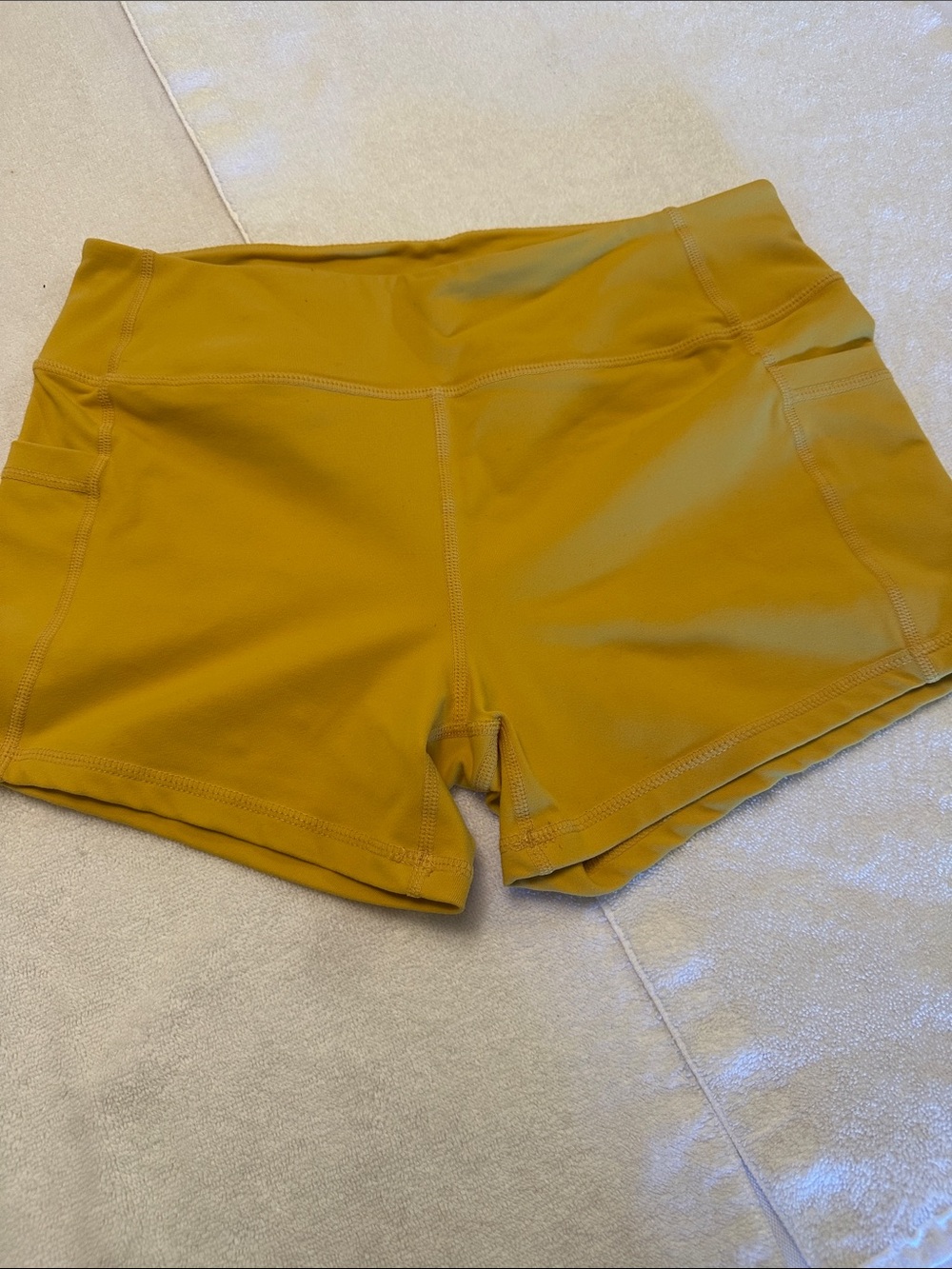 Born Primitive High-Waist Athletic Shorts in Mustard